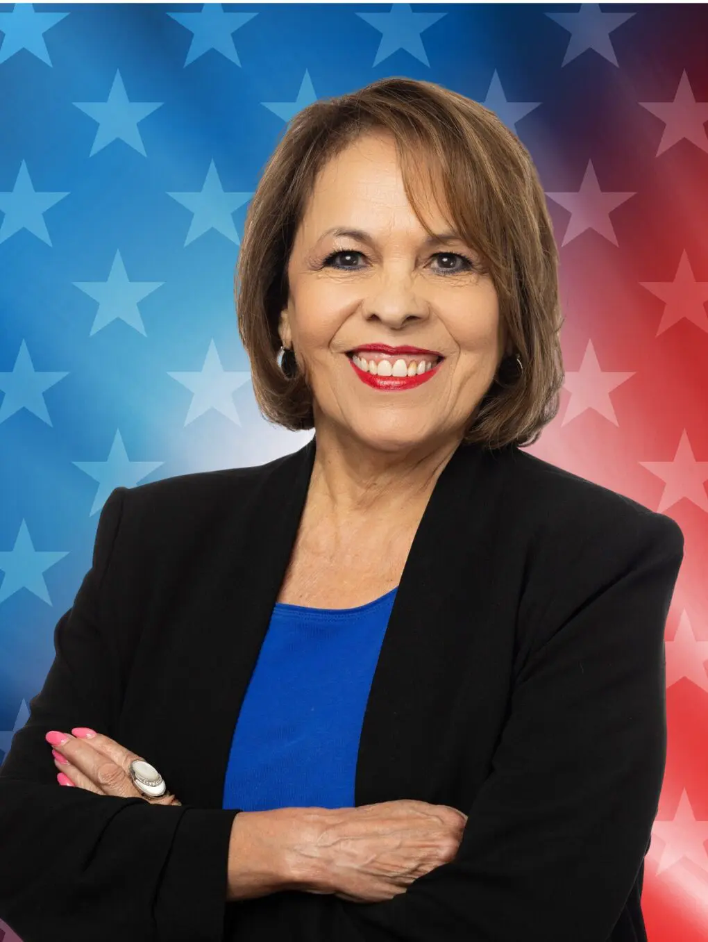 Smiling professional woman with patriotic star backdrop