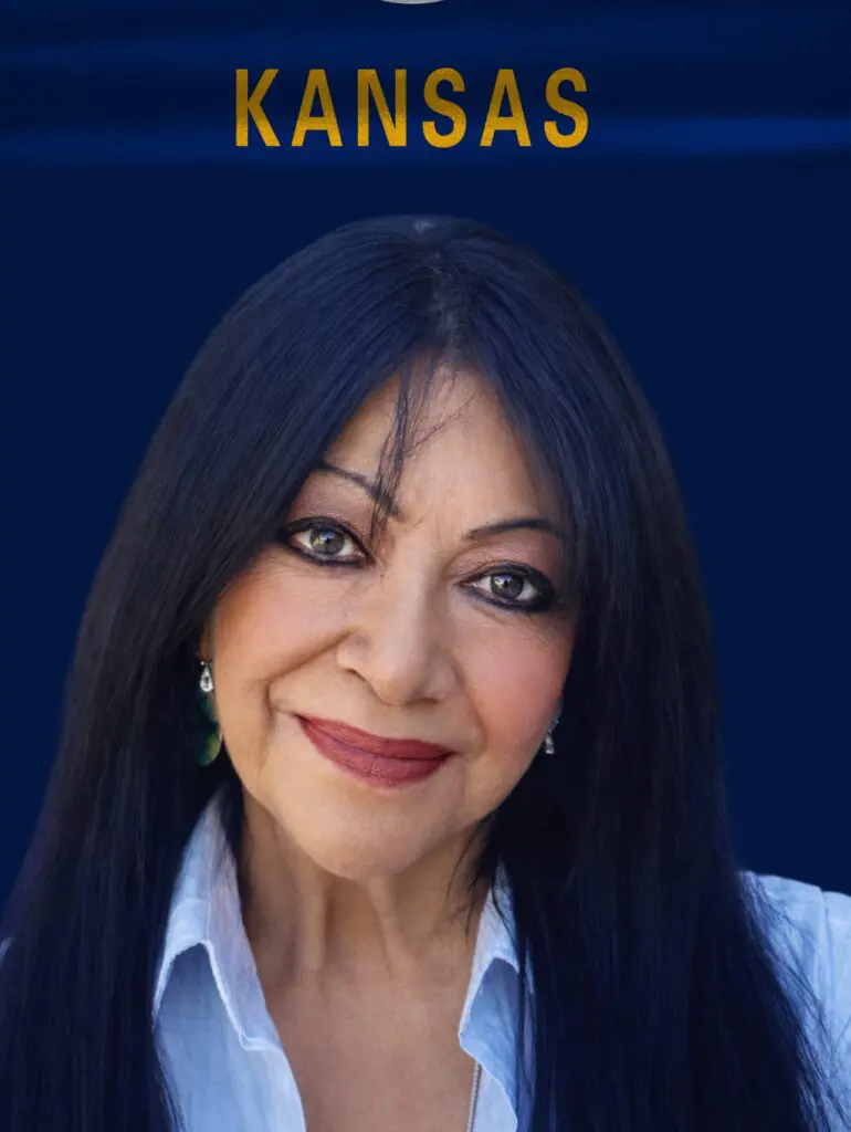 Smiling woman portrait with Kansas backdrop