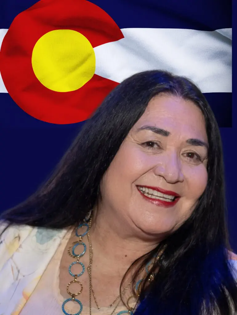 Smiling woman portrait with Colorado flag