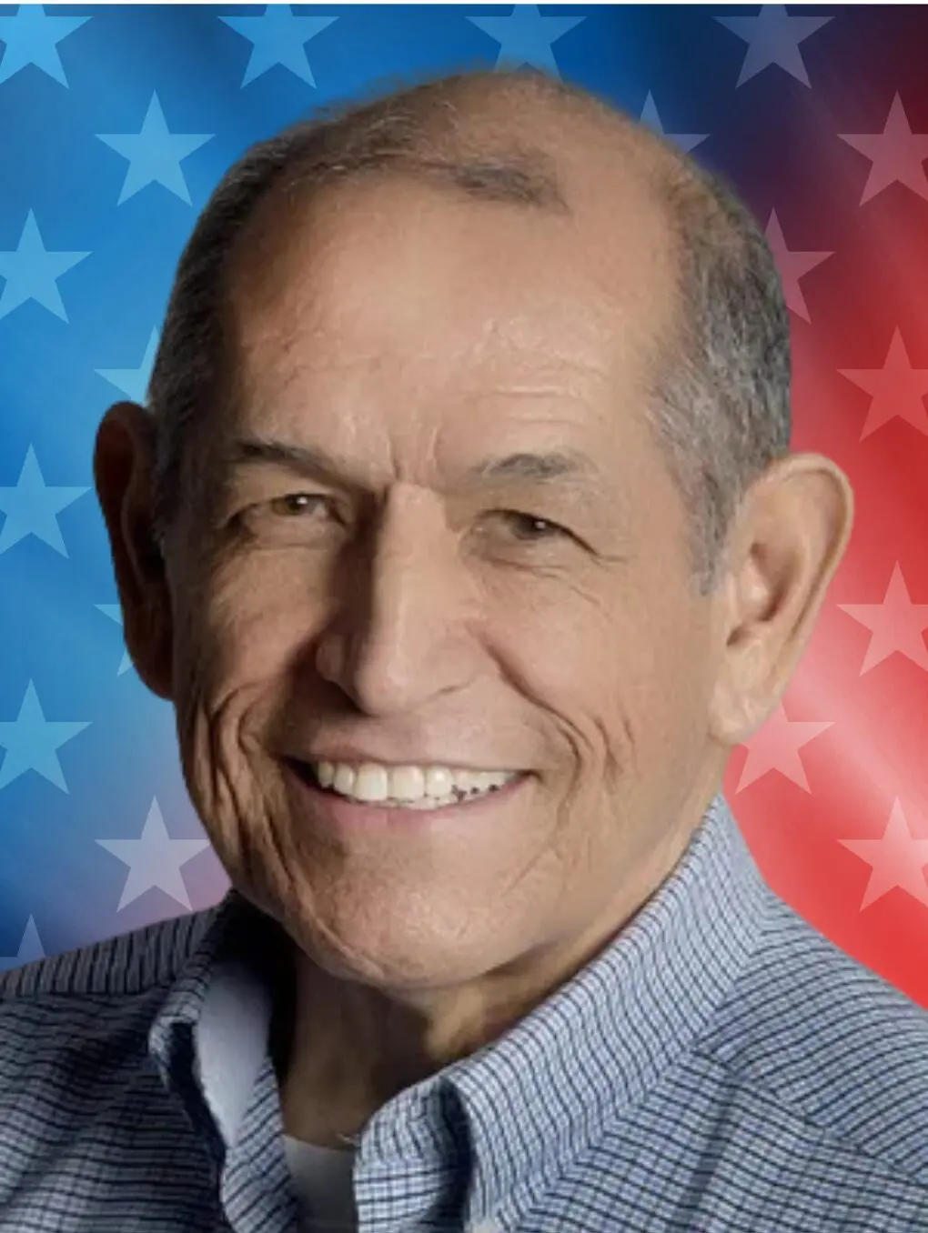 Smiling older man against American flag background