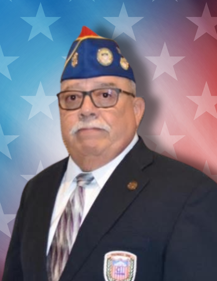 Veteran in suit with patriotic star backdrop